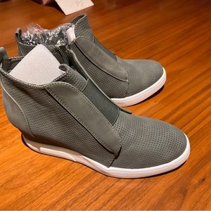 Women’s wedge sneaker. New in box.